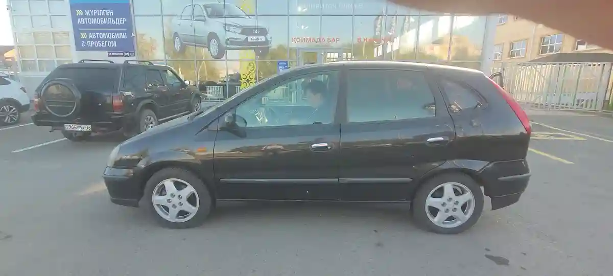 Nissan Almera Tino 2004 года за 2 190 000 тг. в Астана