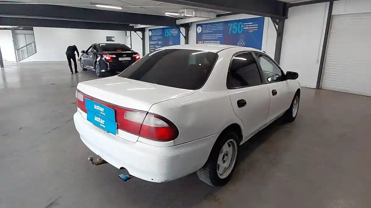 Mazda Familia 1997 года за 990 000 тг. в Астана