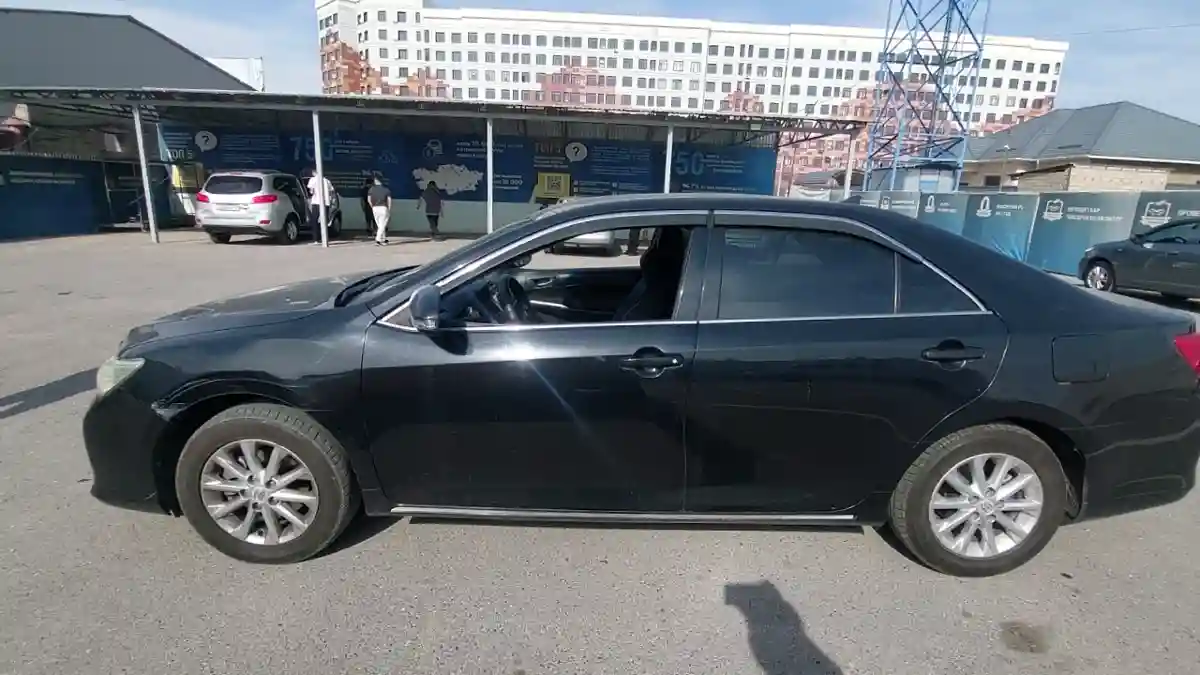 Toyota Camry 2014 года за 7 490 000 тг. в Шымкент