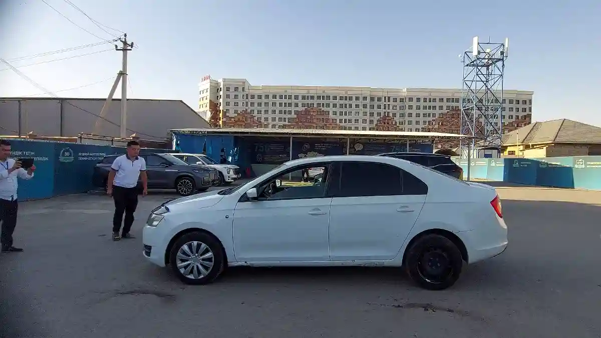 Skoda Rapid 2014 года за 5 000 000 тг. в Шымкент