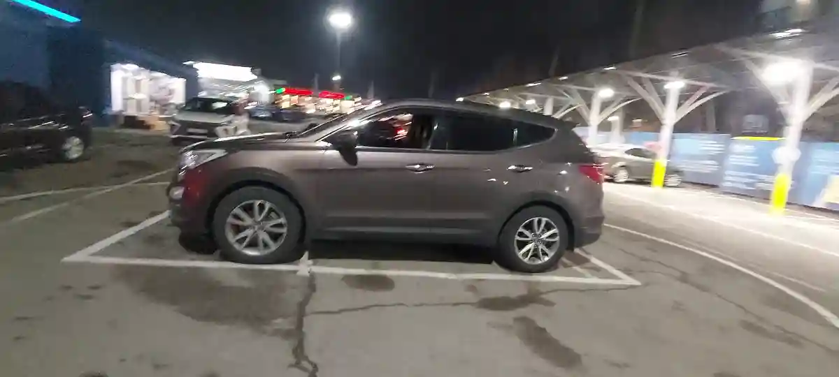 Hyundai Santa Fe 2013 года за 9 700 000 тг. в Алматы