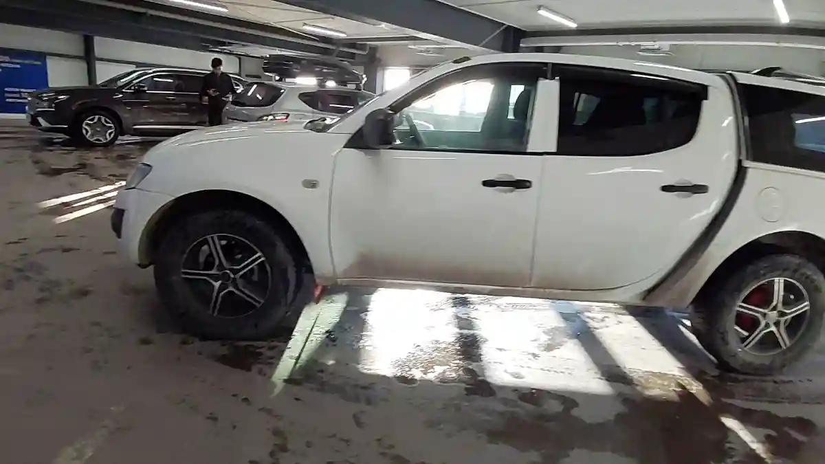 Mitsubishi L200 2012 года за 6 000 000 тг. в Астана