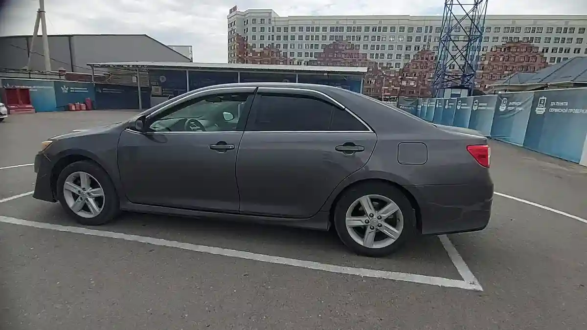 Toyota Camry 2014 года за 7 115 500 тг. в Шымкент